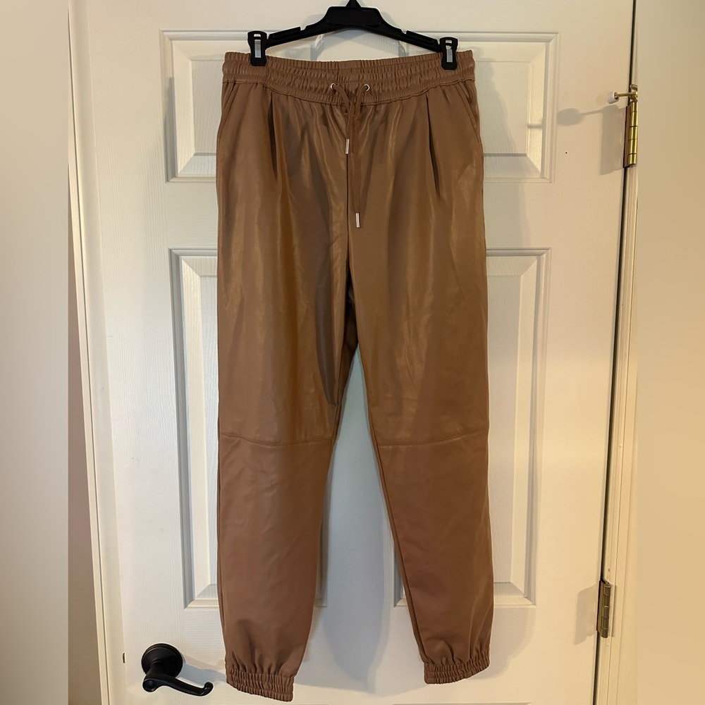 Zara faux leather joggers w Drawstring waist & pockets. Elastic ankle.